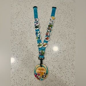 Disney Store Summer Play Days Blue Lanyard with Character Pins